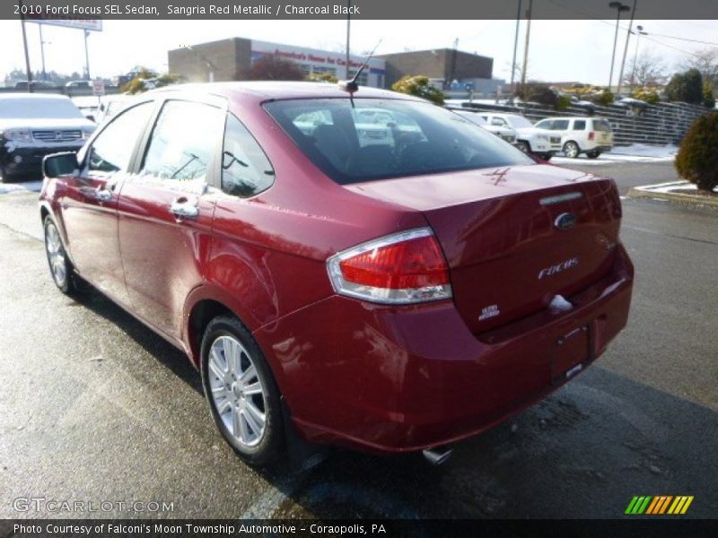 Sangria Red Metallic / Charcoal Black 2010 Ford Focus SEL Sedan