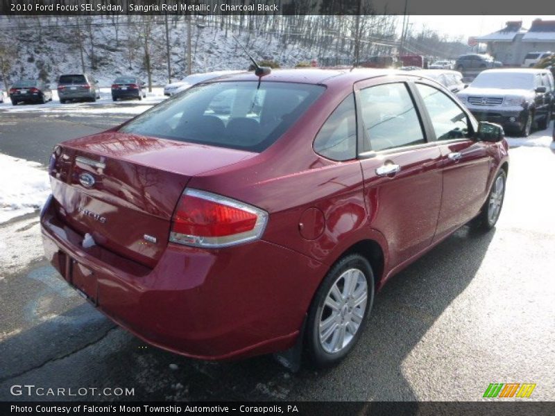 Sangria Red Metallic / Charcoal Black 2010 Ford Focus SEL Sedan