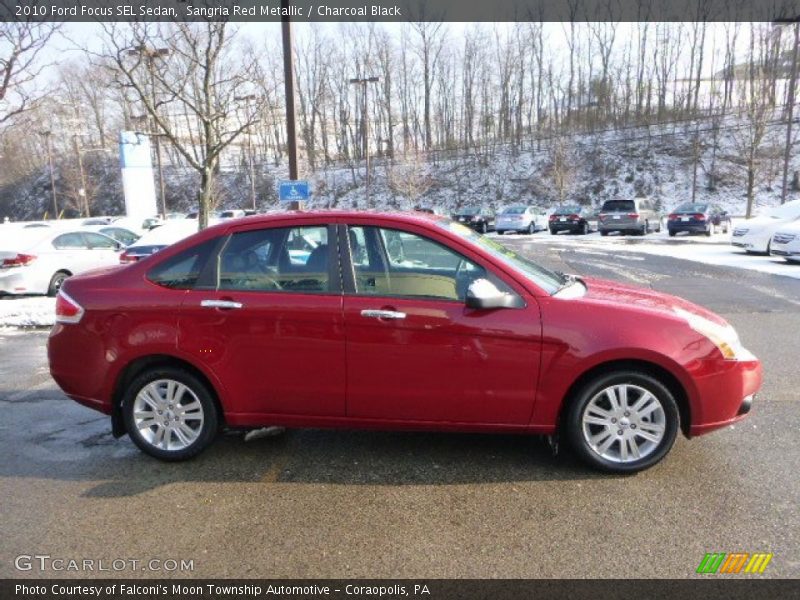 Sangria Red Metallic / Charcoal Black 2010 Ford Focus SEL Sedan