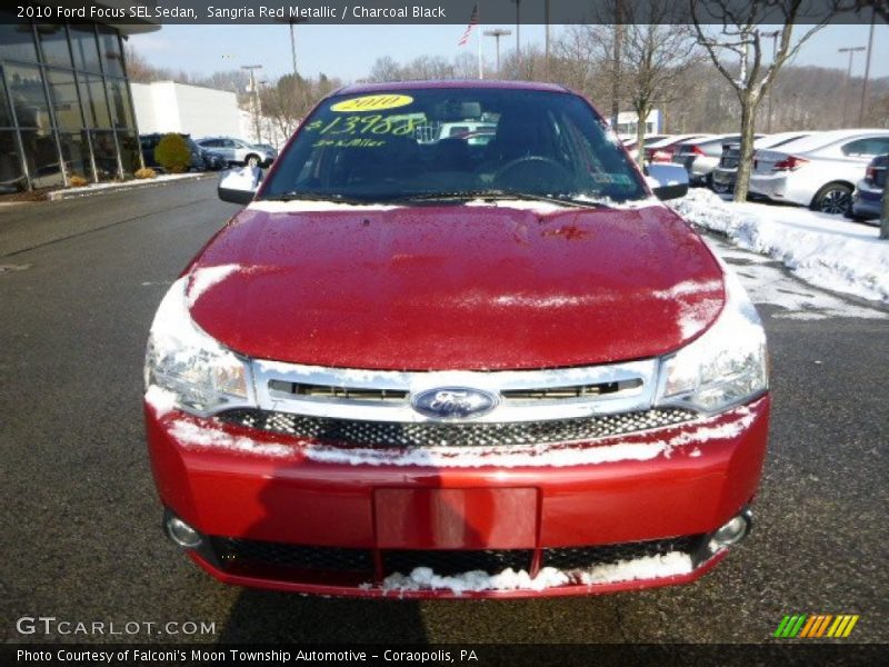 Sangria Red Metallic / Charcoal Black 2010 Ford Focus SEL Sedan