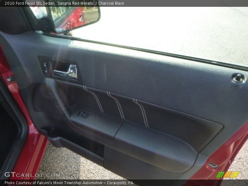 Sangria Red Metallic / Charcoal Black 2010 Ford Focus SEL Sedan