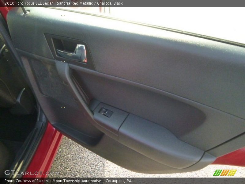 Sangria Red Metallic / Charcoal Black 2010 Ford Focus SEL Sedan