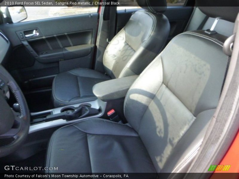 Sangria Red Metallic / Charcoal Black 2010 Ford Focus SEL Sedan