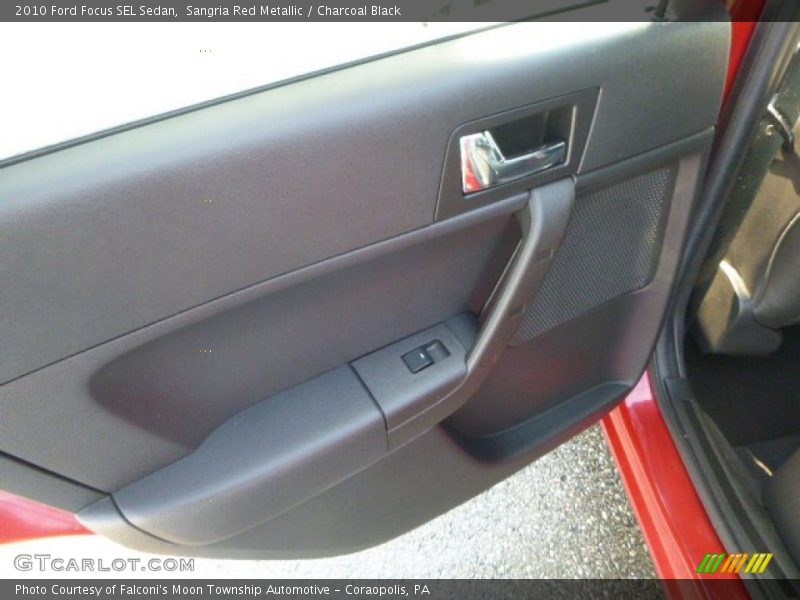Sangria Red Metallic / Charcoal Black 2010 Ford Focus SEL Sedan