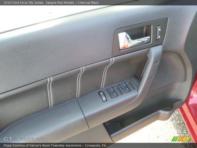 Sangria Red Metallic / Charcoal Black 2010 Ford Focus SEL Sedan