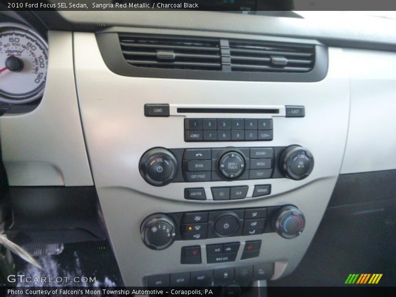 Sangria Red Metallic / Charcoal Black 2010 Ford Focus SEL Sedan
