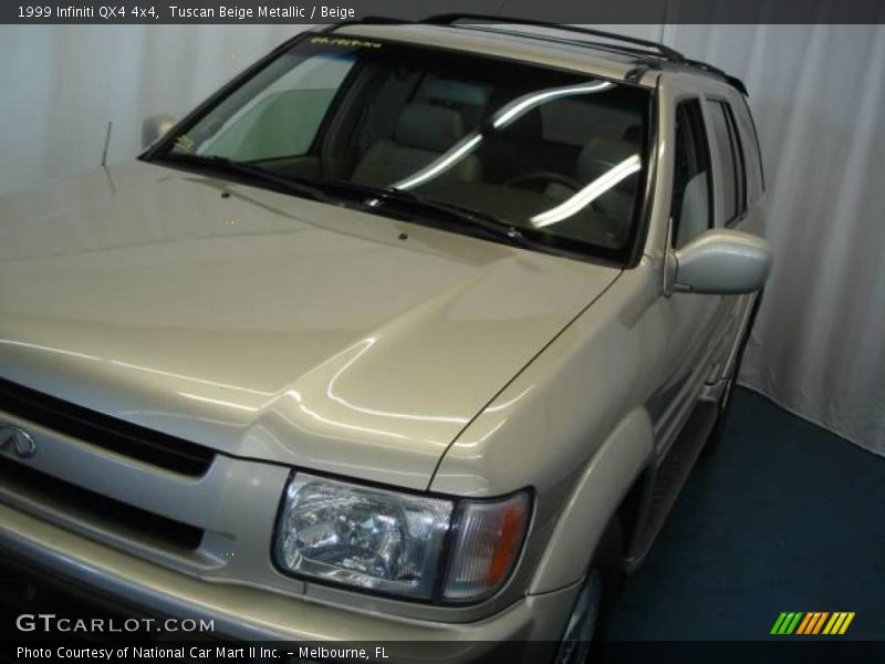 Tuscan Beige Metallic / Beige 1999 Infiniti QX4 4x4