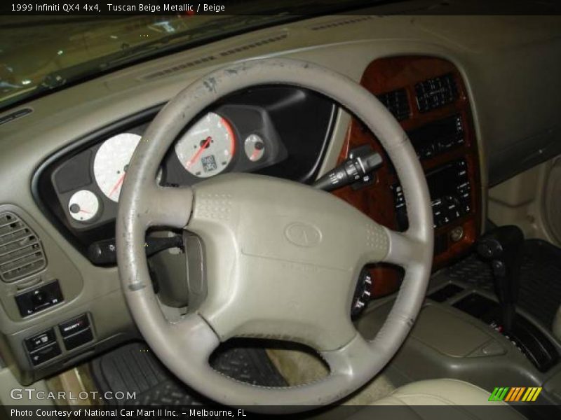 Tuscan Beige Metallic / Beige 1999 Infiniti QX4 4x4