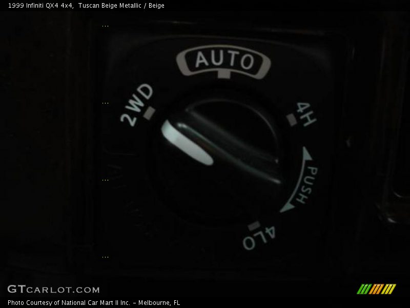 Tuscan Beige Metallic / Beige 1999 Infiniti QX4 4x4