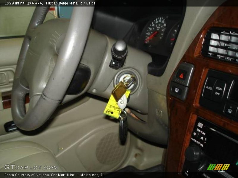 Tuscan Beige Metallic / Beige 1999 Infiniti QX4 4x4