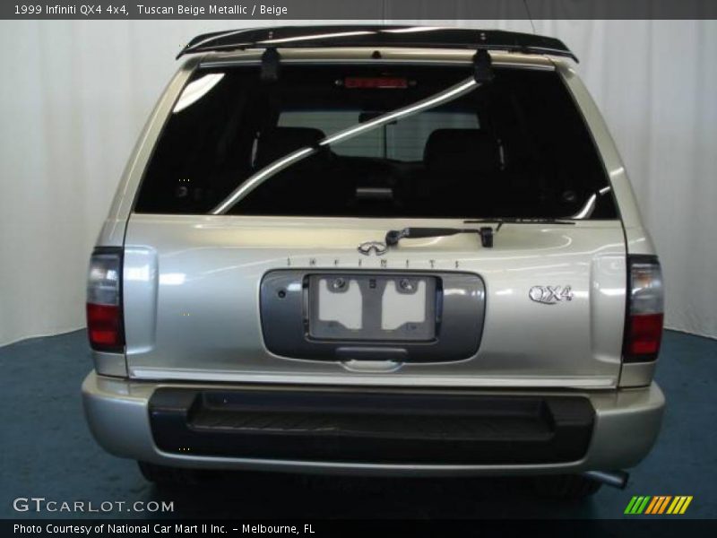 Tuscan Beige Metallic / Beige 1999 Infiniti QX4 4x4