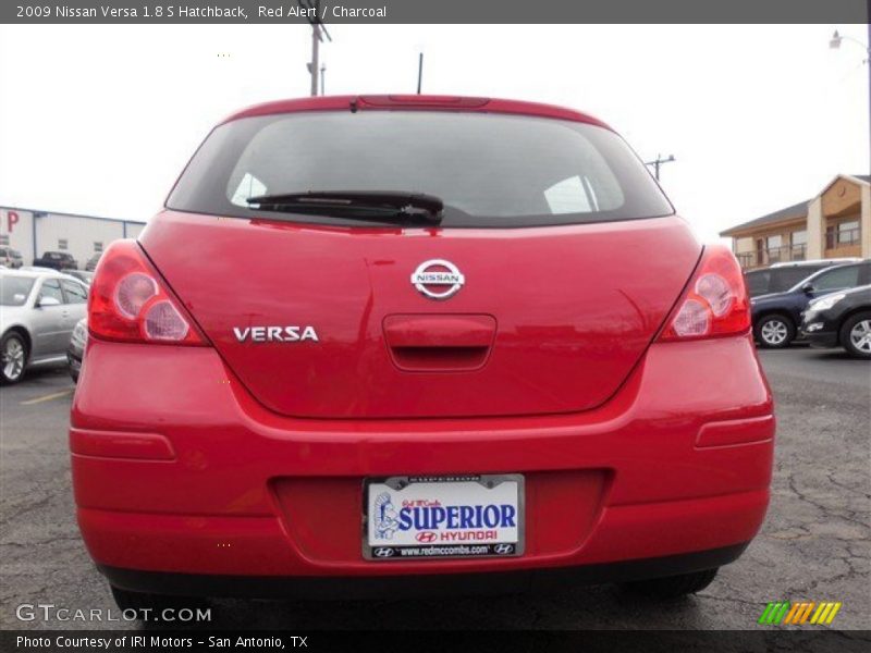 Red Alert / Charcoal 2009 Nissan Versa 1.8 S Hatchback