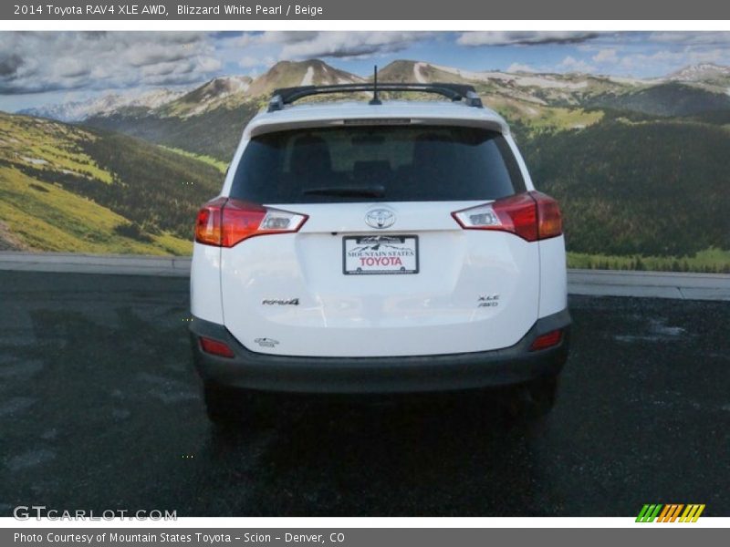 Blizzard White Pearl / Beige 2014 Toyota RAV4 XLE AWD