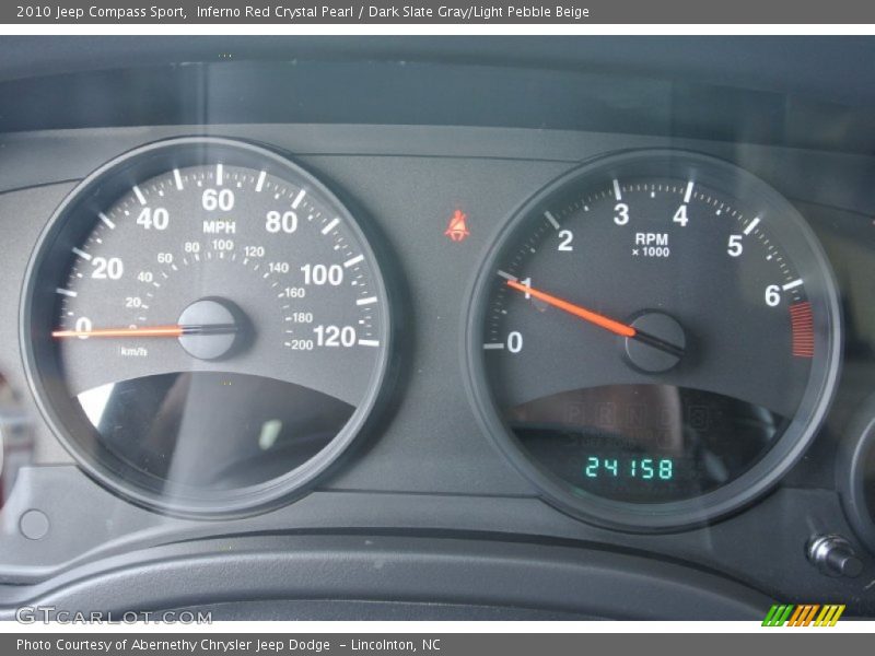 Inferno Red Crystal Pearl / Dark Slate Gray/Light Pebble Beige 2010 Jeep Compass Sport