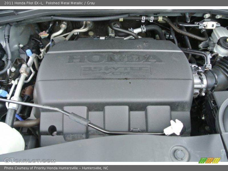 Polished Metal Metallic / Gray 2011 Honda Pilot EX-L