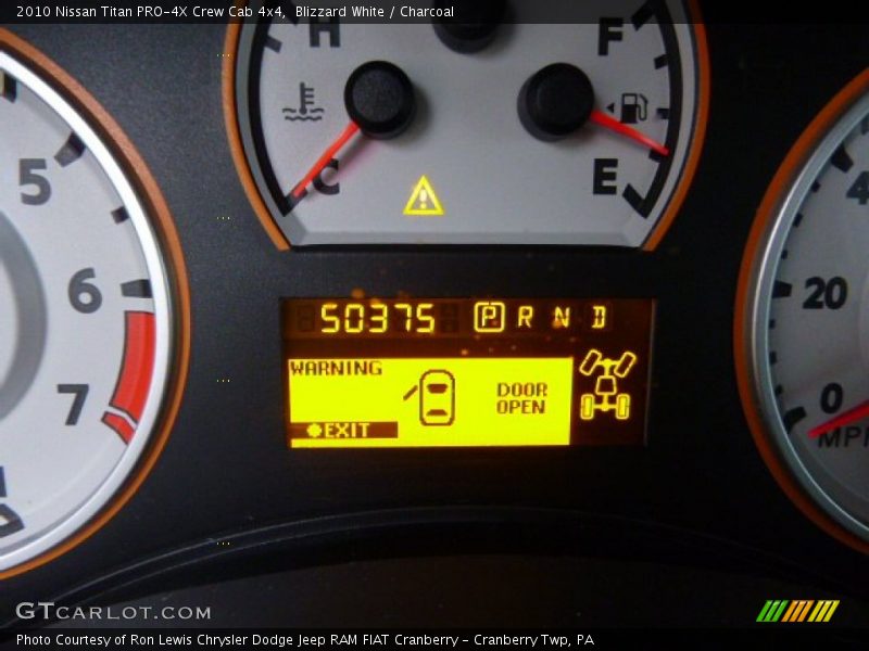 Blizzard White / Charcoal 2010 Nissan Titan PRO-4X Crew Cab 4x4