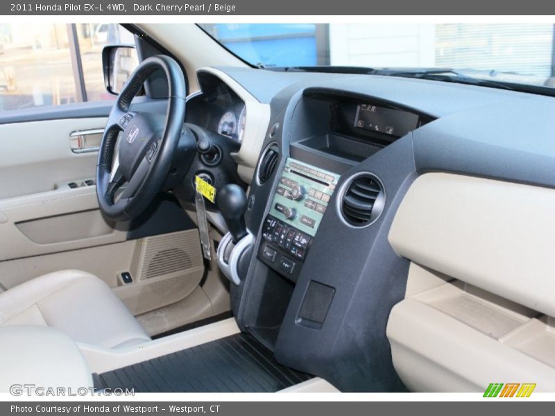 Dark Cherry Pearl / Beige 2011 Honda Pilot EX-L 4WD