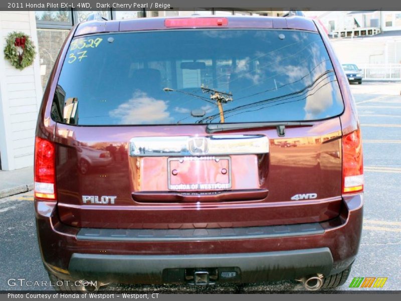 Dark Cherry Pearl / Beige 2011 Honda Pilot EX-L 4WD