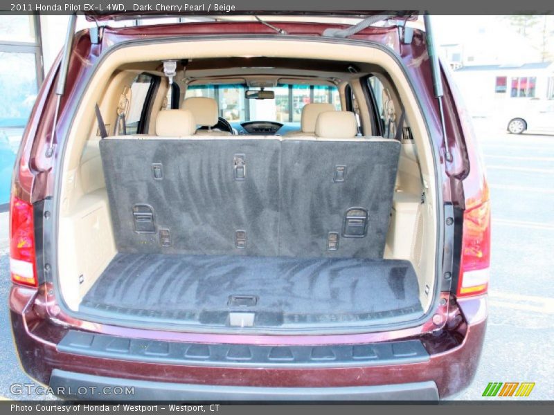 Dark Cherry Pearl / Beige 2011 Honda Pilot EX-L 4WD