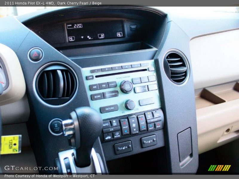 Dark Cherry Pearl / Beige 2011 Honda Pilot EX-L 4WD