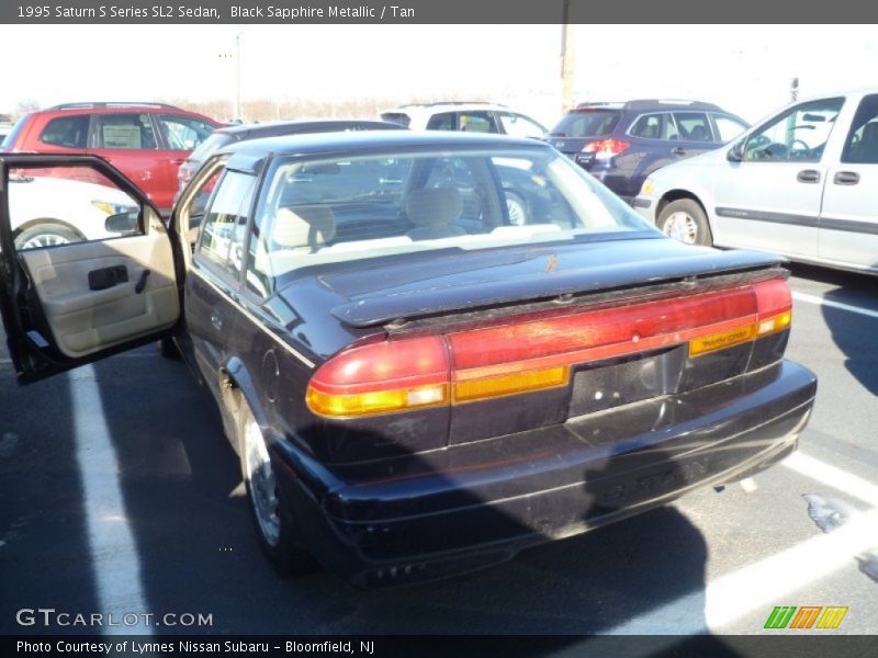 Black Sapphire Metallic / Tan 1995 Saturn S Series SL2 Sedan