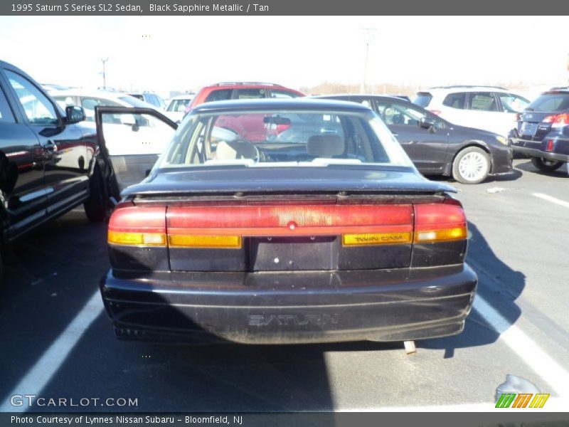 Black Sapphire Metallic / Tan 1995 Saturn S Series SL2 Sedan