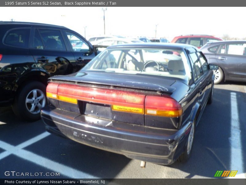 Black Sapphire Metallic / Tan 1995 Saturn S Series SL2 Sedan