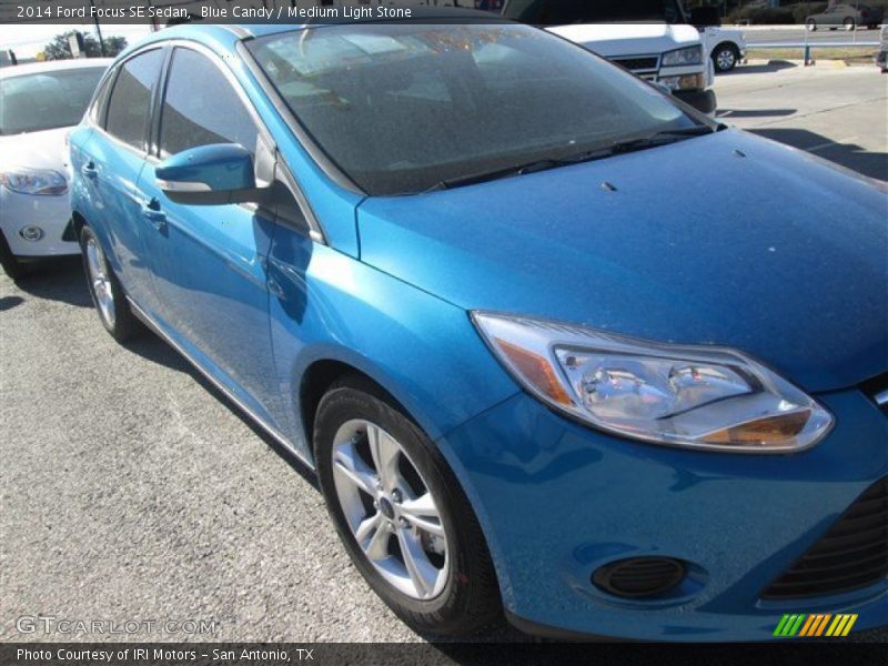 Blue Candy / Medium Light Stone 2014 Ford Focus SE Sedan