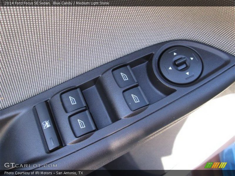Blue Candy / Medium Light Stone 2014 Ford Focus SE Sedan