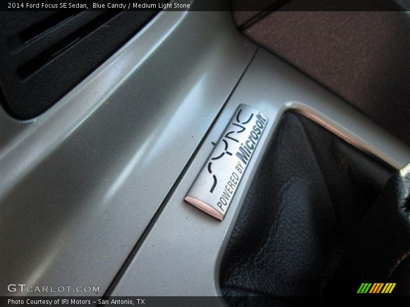 Blue Candy / Medium Light Stone 2014 Ford Focus SE Sedan