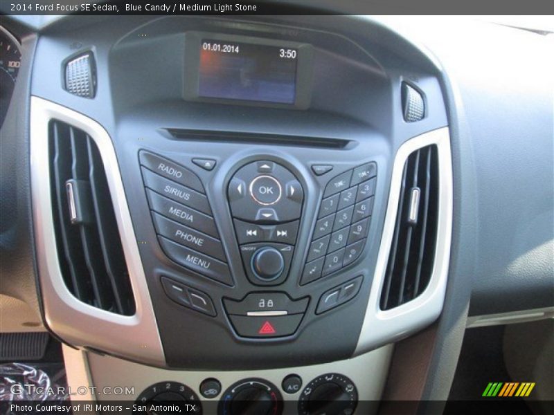 Blue Candy / Medium Light Stone 2014 Ford Focus SE Sedan