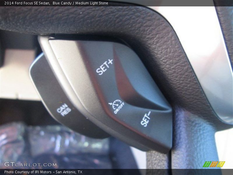 Blue Candy / Medium Light Stone 2014 Ford Focus SE Sedan