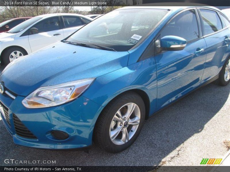 Blue Candy / Medium Light Stone 2014 Ford Focus SE Sedan