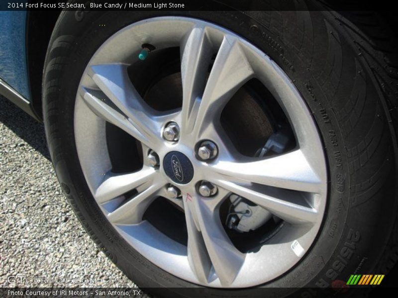 Blue Candy / Medium Light Stone 2014 Ford Focus SE Sedan