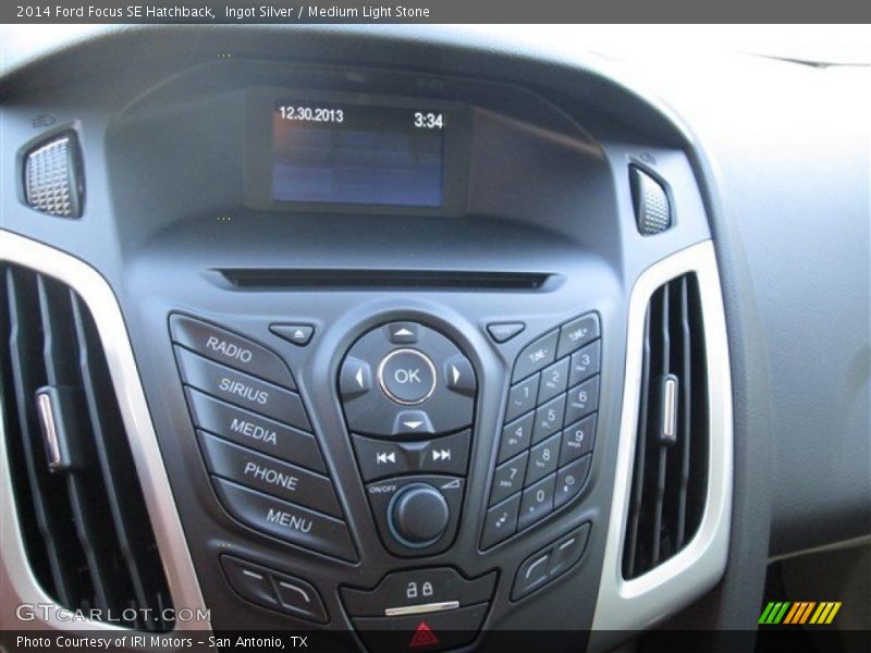 Ingot Silver / Medium Light Stone 2014 Ford Focus SE Hatchback