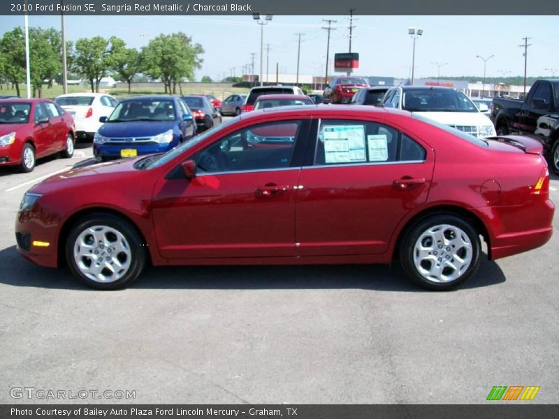 Sangria Red Metallic / Charcoal Black 2010 Ford Fusion SE