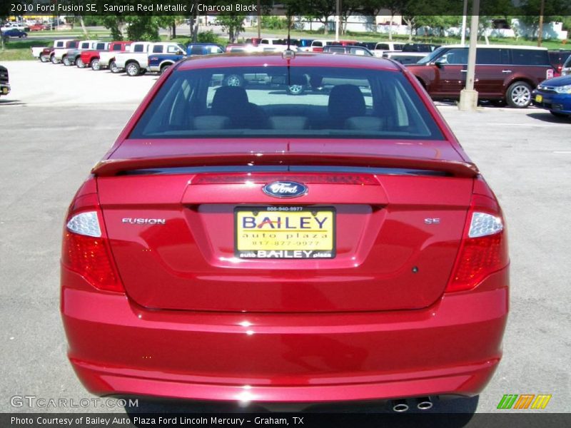 Sangria Red Metallic / Charcoal Black 2010 Ford Fusion SE