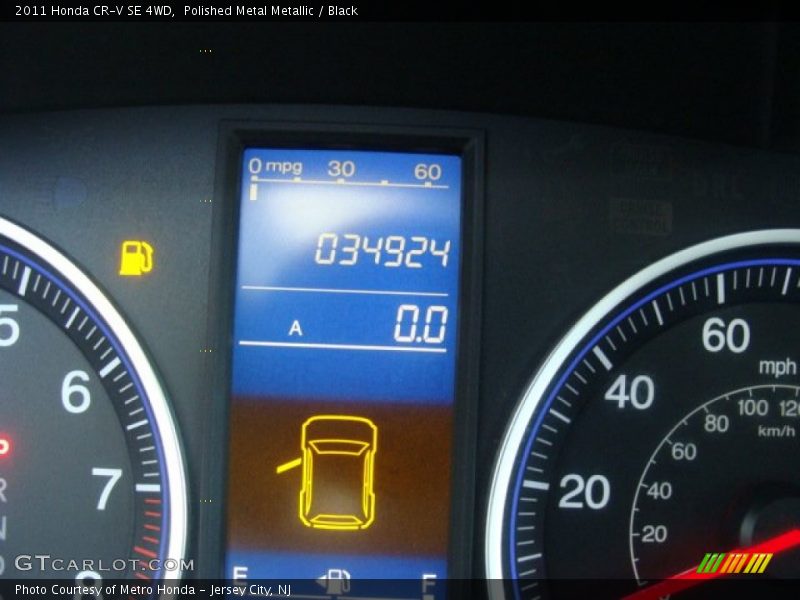 Polished Metal Metallic / Black 2011 Honda CR-V SE 4WD
