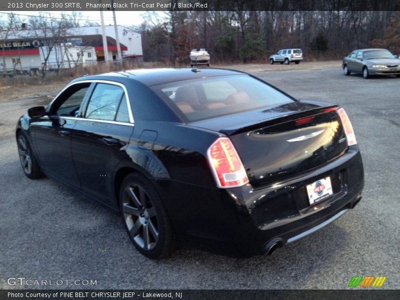 Phantom Black Tri-Coat Pearl / Black/Red 2013 Chrysler 300 SRT8