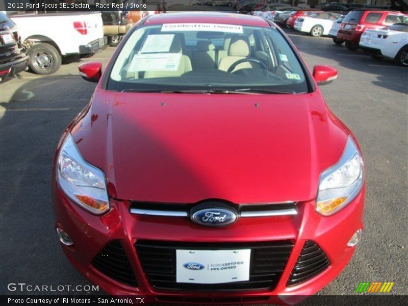 Race Red / Stone 2012 Ford Focus SEL Sedan
