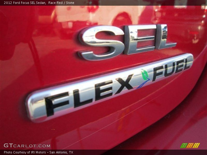 Race Red / Stone 2012 Ford Focus SEL Sedan