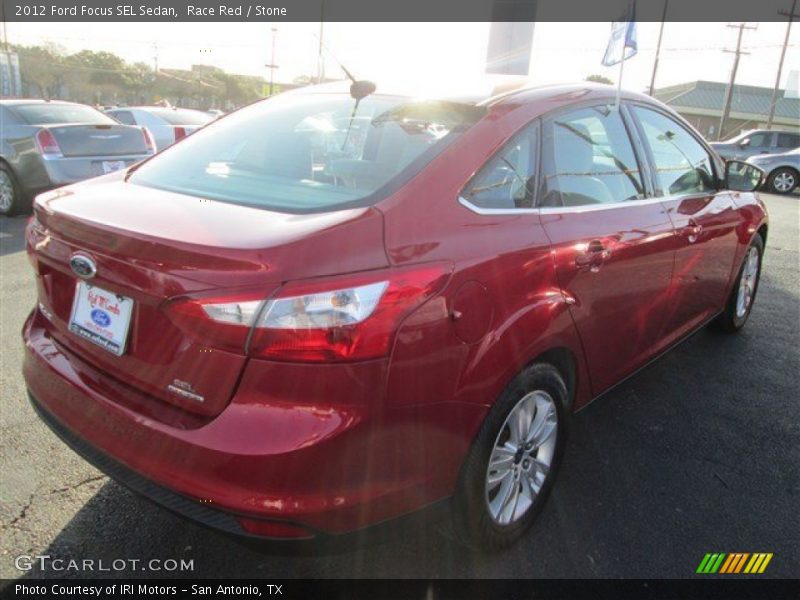 Race Red / Stone 2012 Ford Focus SEL Sedan
