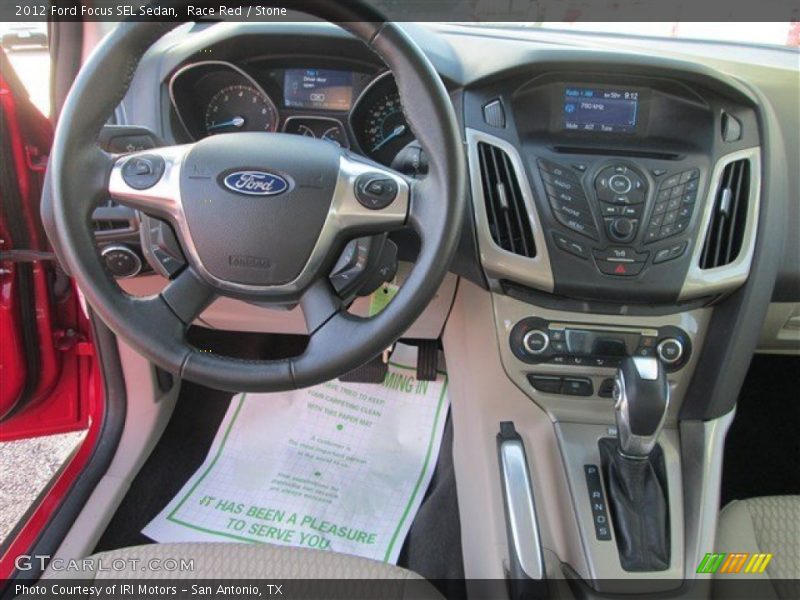 Race Red / Stone 2012 Ford Focus SEL Sedan