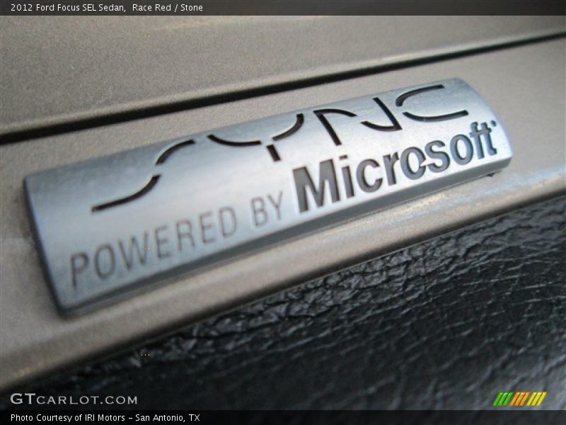 Race Red / Stone 2012 Ford Focus SEL Sedan