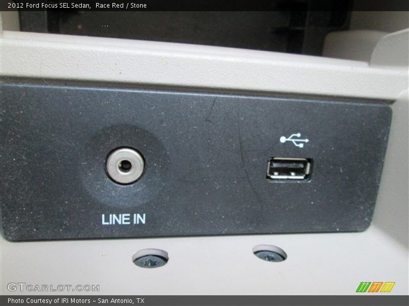 Race Red / Stone 2012 Ford Focus SEL Sedan