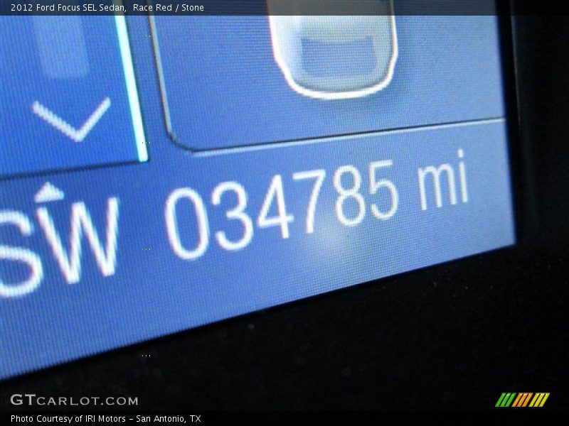 Race Red / Stone 2012 Ford Focus SEL Sedan