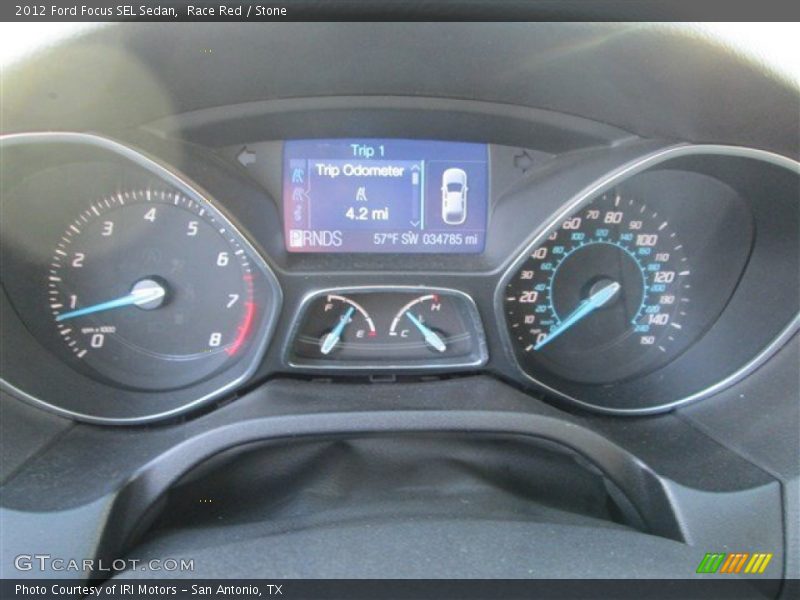 Race Red / Stone 2012 Ford Focus SEL Sedan
