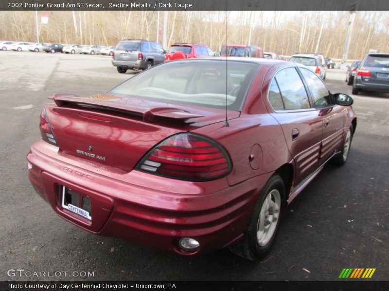 Redfire Metallic / Dark Taupe 2002 Pontiac Grand Am SE Sedan