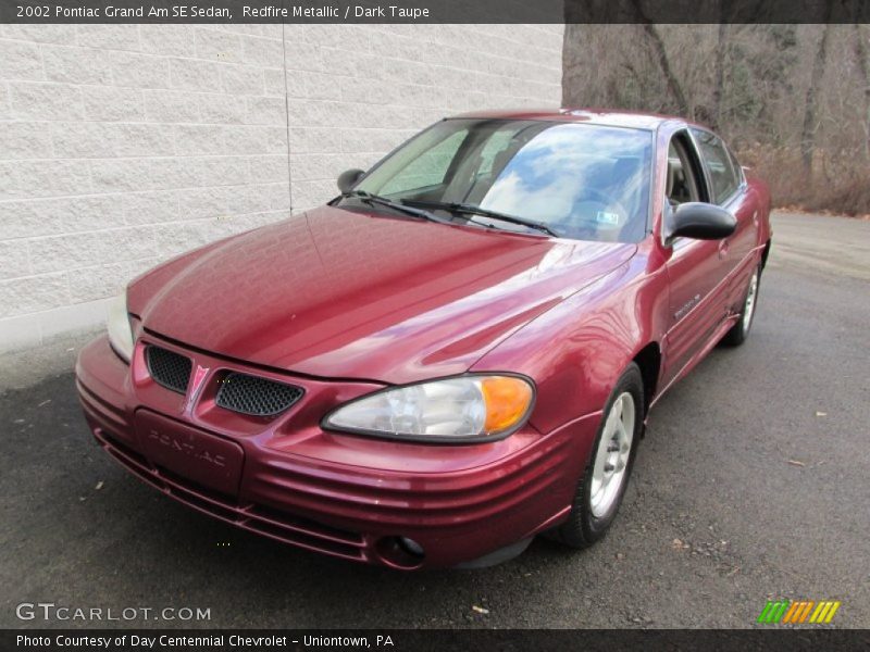Redfire Metallic / Dark Taupe 2002 Pontiac Grand Am SE Sedan
