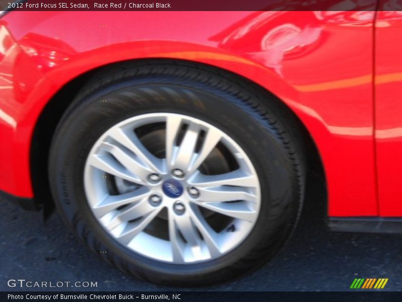 Race Red / Charcoal Black 2012 Ford Focus SEL Sedan